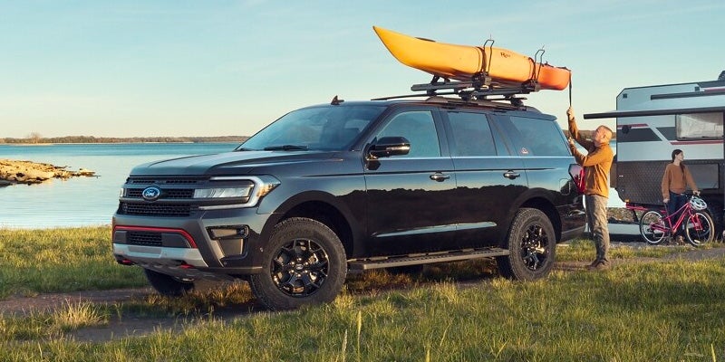2024 ford expedition with a yellow kayak on the roof